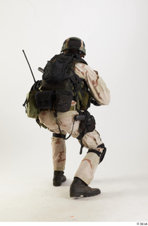 Photos Reece Bates Army Navy Seals Operator - Poses crouching…